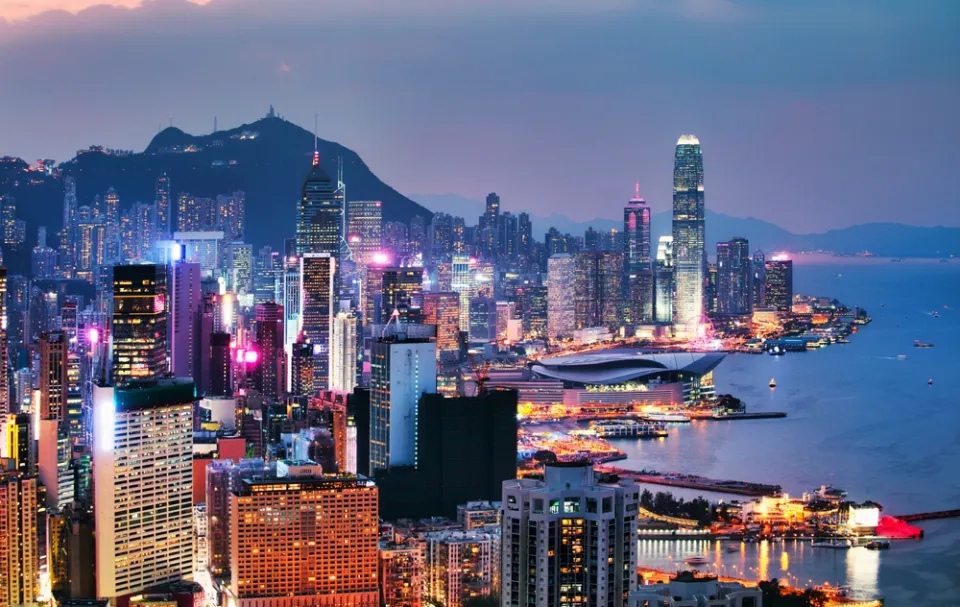 Hong Kong night skyline — illuminated skyscrapers and Victoria Harbour from Victoria Peak