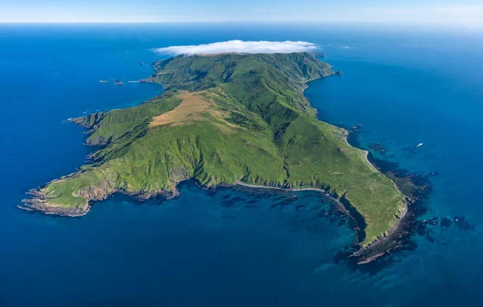 Moneron Island from above — the cruise's full geography in a single frame